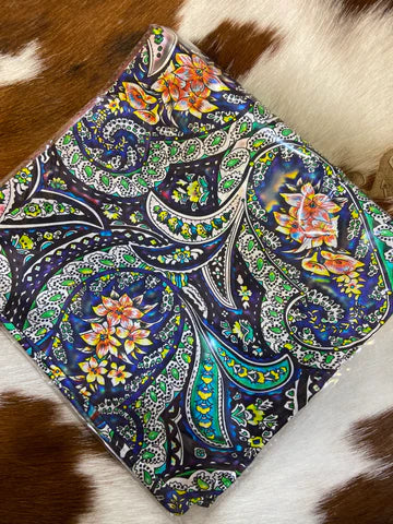 Vibrant Western wild rag with colorful patterns, versatile for wearing around the neck or in the hair