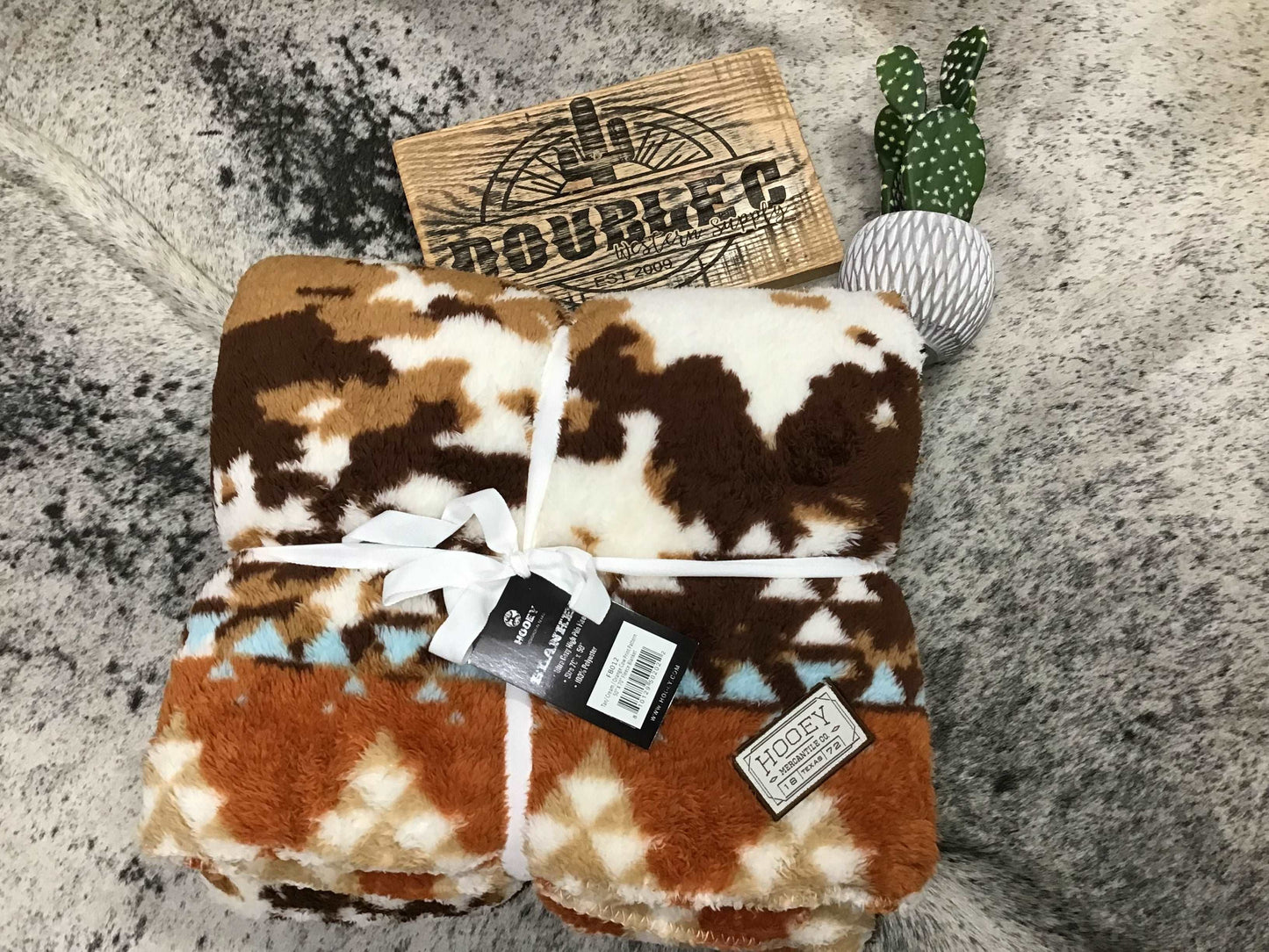 HOOEY FLEECE BLANKET" TAN/CREAM /ORANGE COW PRINT-RED/WHITE/TURQUOISE SERAPE PATTERN Blanket Hooey