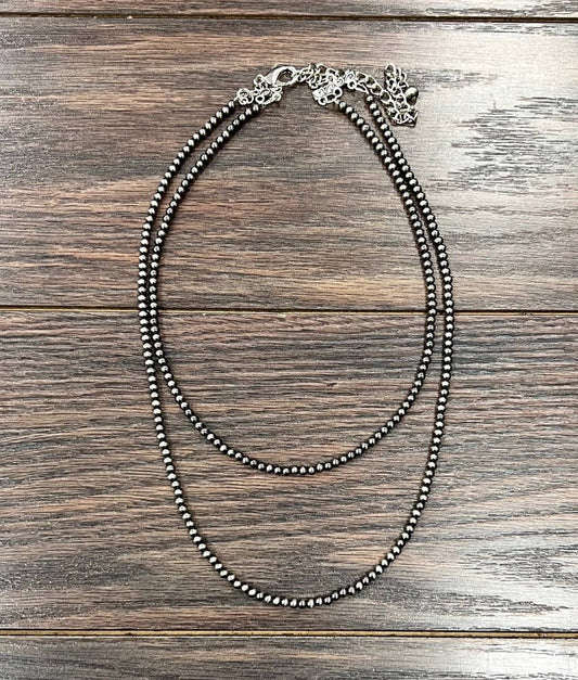 738057, Handmade 20" 4mm Polish Navajo Bead Necklace NECKLACE ISAC Trading Inc